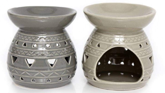 Boho-style Aztec wax melter with cut-out detailing